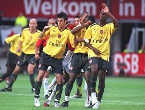 Arsenal wall (L>R) Cesc Fabregas, Alex Song and Justin Hoyte Arsenal wall (L>R) Cesc Fabregas, Alex Song and Justin Hoyte