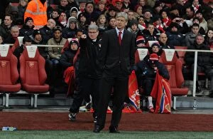 Images Dated 27th December 2010: Arsenal Wenger the Arsenal Manager and his Assistant Pat Rice. Arsenal 3: 1 Chelsea
