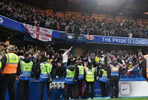 Arsenal Wins Premier League: Jubilant Fans Celebrate at Stamford Bridge