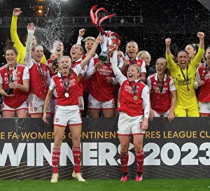 Arsenal Women Celebrate Conti Cup Victory: Leah Williamson and Kim Little Lift the Trophy