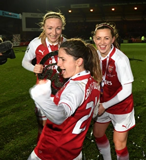 Arsenal Women Celebrate Continental Cup Victory: Quinn, McCabe, and van de Donk Lift the Trophy