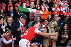 Arsenal Women Celebrate FA WSL Title: Katie McCabe Amidst Jubilant Fans