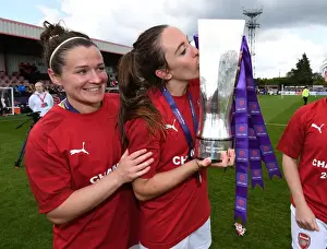 Arsenal Women Celebrate Historic WSL Title Win: Mitchell and Evans Lift the Trophy