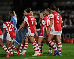 Arsenal Women Celebrate Kim Little's Goal in UEFA Women's Champions League