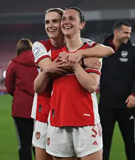 Arsenal Women V VfL Wolfsburg 2021-22 Prints: Arsenal Women Celebrate Quarterfinal Victory Over VfL Wolfsburg: Miedema and Wubben-Moy Embrace in Jubilation