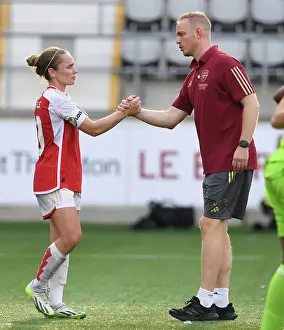 Arsenal Women V Paris FC 2023-24 Prints: Arsenal Women Celebrate UEFA Champions League Victory: Kim Little and Jonas Eidevall Embrace Triumph
