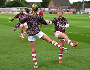 Arsenal Women Prepare for Slavia Prague: Leah Williamson and Kim Little Warm Up