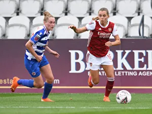 Arsenal Women vs Reading Women: FA WSL Clash at Meadow Park - Intense Battle between Noelle Maritz and Molly Bartrop