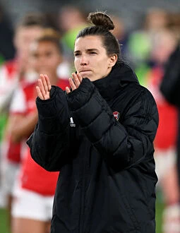 Images Dated 31st March 2022: Arsenal Women's Champions League: Tobin Heath Celebrates Quarterfinal Victory with Fans