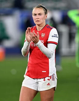 Images Dated 31st March 2022: Arsenal Women's Champions League Victory: Caitlin Foord Celebrates with Adoring Fans