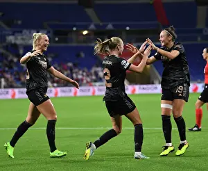 Olympic Lyonnais V Arsenal Women 2022-23 Prints: Arsenal Women's Double Strike: Celebrating Goals Against Olympique Lyonnais in UEFA Women's Champions League