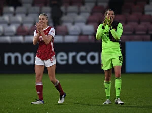 Images Dated 6th December 2020: Arsenal Women's FA WSL Triumph: Leah Williamson and Lydia Williams Celebrate with Fans