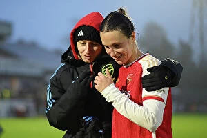 Images Dated 27th November 2023: Arsenal Women's Glory: Leah Williamson and Lotte Wubben-Moy's Emotional Reunion after Securing