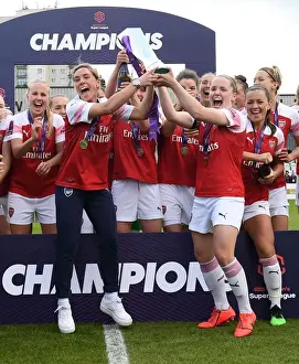 Arsenal Women's Historic WSL Title Win: Kim Little and Jordan Nobbs Celebrate with the Trophy