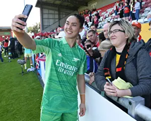 West Ham United Women V Arsenal Women 2021-22 Prints: Arsenal Women's Manuela Zinsberger Takes a Selfie with Fan after West Ham United Match