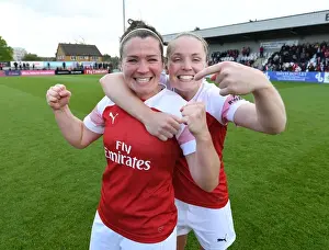 Arsenal Women's Mitchell and Little in Triumphant Victory Celebration