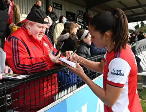 Arsenal Women's Rafaelle Celebrates Victory over Manchester United with Autograph Signing Session