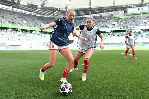 Vfl Wolfsburg V Arsenal Women 2022-23 Prints: Arsenal Women's Squad Warm-Up Ahead of VfL Wolfsburg Semi-Final Showdown