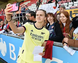 West Ham United Women V Arsenal Women 2021-22 Prints: Arsenal Women's Star Vivianne Miedema Takes a Selfie with Fan after West Ham United Match