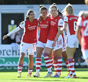 Arsenal Women's Super League Victory: Lotte Wubben-Moy Scores Second Goal Amidst Celebrations with Tobin Heath and Vivianne Miedema