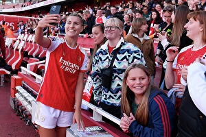 Arsenal v Aston Villa 2023-24 Collection: Arsenal Women's Team Celebrates Thrilling Victory over Aston Villa with Elated Fans at Emirates