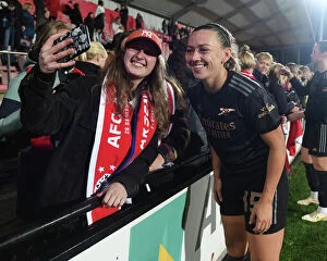 Images Dated 28th September 2022: Arsenal Women's Team Triumphs at AFC Ajax: McCabe's Selfie with Fans in UEFA Women's Champions