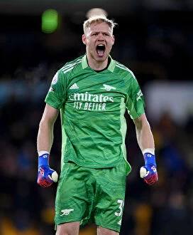 Images Dated 10th February 2022: Arsenal's Aaron Ramsdale Celebrates Win Against Wolverhampton Wanderers in Premier League