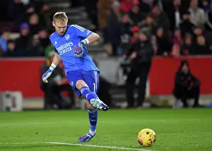 Arsenal's Aaron Ramsdale Crosses Against Brentford in 2023-24 Premier League Clash