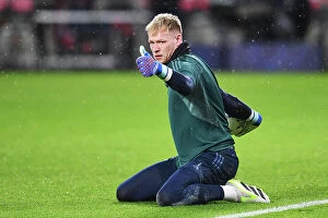 PSV Eindoven v Arsenal 2023-24 Collection: Arsenal's Aaron Ramsdale Gears Up for PSV Eindhoven Showdown in Champions League (2023-24)