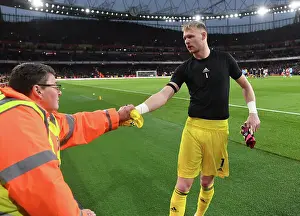 Arsenal's Aaron Ramsdale Gifts Shirt to Fan After Arsenal v Brentford Match