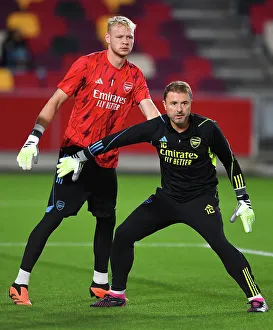 Arsenal's Aaron Ramsdale and Inaki Cana: Pre-Match Warm-Up at Brentford's Gtech Community Stadium (Carabao Cup 2023-24)