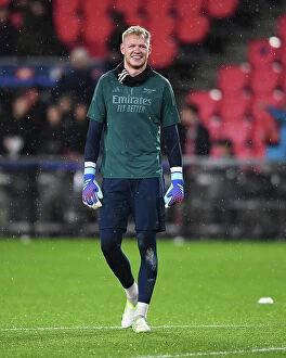 PSV Eindoven v Arsenal 2023-24 Collection: Arsenal's Aaron Ramsdale Prepares for PSV Eindhoven Showdown in Champions League