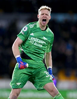 Images Dated 10th February 2022: Arsenal's Aaron Ramsdale: Savoring Premier League Victory Over Wolverhampton Wanderers