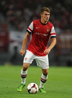 Nagoya Grampus V Arsenal 2013-14 Prints: Arsenal's Aaron Ramsey in Action against Nagoya Grampus, 2013 (Japan)