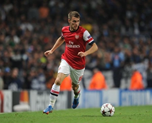 Arsenal V Napoli 2013-14 Prints: Arsenal's Aaron Ramsey in Action Against Napoli, UEFA Champions League 2013-14