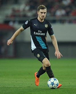 Olympiacos V Arsenal 2015-16 Prints: Arsenal's Aaron Ramsey in Action against Olympiacos
