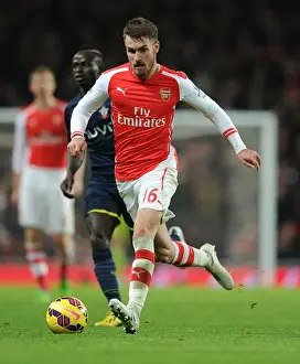Arsenal V Southampton 2014-15 Prints: Arsenal's Aaron Ramsey in Action against Southampton (2014-15)