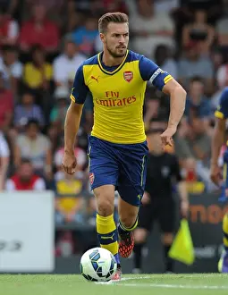 Arsenal's Aaron Ramsey in Action: A Thrilling Pre-Season Clash against Boreham Wood