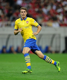 Uwara Red Diamonds V Arsenal 2013-14 Prints: Arsenal's Aaron Ramsey in Action against Urawa Red Diamonds, Japan 2013