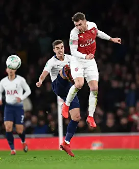 Arsenal's Aaron Ramsey Battles with Tottenham's Harry Winks in Carabao Cup Quarterfinal Showdown