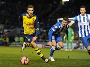 Brighton And Hove Albion V Arsenal - FA Cup 2014/15 Prints: Arsenal's Aaron Ramsey Breaks Past Brighton's Defense in FA Cup Clash