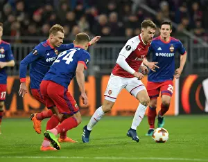 CSKA Moscow V Arsenal 2017-18 Prints: Arsenal's Aaron Ramsey Clashes with CSKA Moscow's Vasili Berezutski in Europa League Quarterfinal