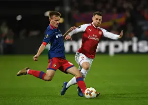 CSKA Moscow V Arsenal 2017-18 Prints: Arsenal's Aaron Ramsey Closes Down CSKA Moscow's Konstantin Kuchaev in Europa League Quarterfinal