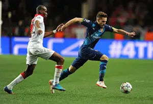 Monaco V Arsenal 2014/15 Prints: Arsenal's Aaron Ramsey Dashes Past Monaco's Geoffrey Kondogbia in UEFA Champions League Showdown