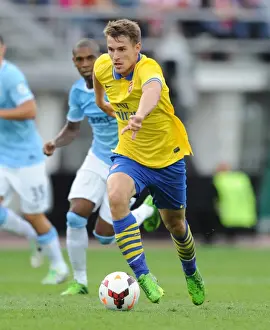 Arsenal V Manchester City Pre Season 2013-14 Prints: Arsenal's Aaron Ramsey Faces Manchester City in 2013: Pre-Season Clash in Helsinki