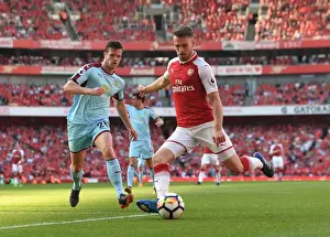 Arsenal's Aaron Ramsey Faces Off Against Burnley's Kevin Long in Intense Premier League Clash