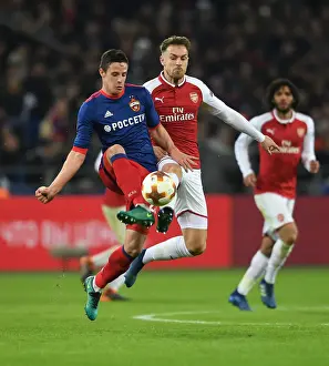 CSKA Moscow V Arsenal 2017-18 Prints: Arsenal's Aaron Ramsey Faces Off Against CSKA Moscow's Kristijan Bistrovic in Europa League Quarterfinal
