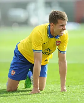 Arsenal V Manchester City Pre Season 2013-14 Prints: Arsenal's Aaron Ramsey Faces Off Against Manchester City in 2013 Pre-Season Clash