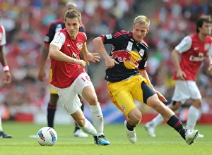 Arsenal V New York Red Bulls 2011-12 Prints: Arsenal's Aaron Ramsey Faces Off Against New York Red Bulls Dax McCarty during the 2011-12 Emirates Cup