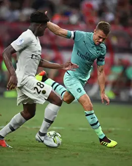 Arsenal V PSG Pre Season Friendly 2018-19 Prints: Arsenal's Aaron Ramsey Faces Off Against PSG's Loic Mbe Soh in 2018 International Champions Cup